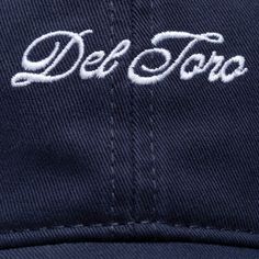 The Del Toro Dad Hat is made from garment washed cotton-twill that's embroidered with the Del Toro script logo. The hat is unstructured with a low profile "dad" hat fit. Embroidered Cotton Fitted Hat With Curved Brim, Classic Dad Hat With Embroidered Logo And Flat Bill, Cotton Fitted Hat With Embroidered Logo And Flat Bill, Classic Cotton Fitted Hat With Embroidered Logo, Cotton Dad Hat With Letter Embroidery And Flat Bill, Cotton Fitted Hat With Embroidered Logo, Classic Cotton Snapback Hat With Embroidered Logo, Classic Cotton Dad Hat With Embroidered Logo, Classic Cotton Trucker Hat With Embroidered Logo