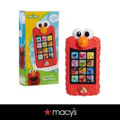 a cell phone with an elmo face on the front and box for it's packaging