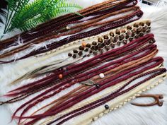 🔅🖥️ The color of the product may not match the color on your monitor. It depends on the settings of your monitor. 1 Clip holds 2 double ended dreadloks  Add some instant festival vibes to your look with these Clip In Dreads in Brown, Blonde, and Burgundy! These handcrafted synthetic extensions on clips are perfect for adding a touch of boho chic to your style in minutes. Whether you're heading to a music festival or just want to change up your everyday look, these colorful dreads are versatile and easy to style. Each set includes a mix of shades to create a unique and eye-catching blend. Embrace your adventurous side and stand out from the crowd with these trendy dreads. This item is made to order. Please kindly note that each new item might be slightly different from the original photo. Colorful Dreads, Clip In Dreads, Kanekalon Hairstyles, Solid Shampoo, Festival Vibes, Burgundy Hair, Synthetic Hair Extensions, Brown Blonde, Color Textures