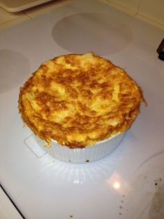 a baked dish sitting on top of a stove