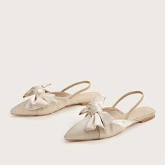 Step into elegance with our Beige Satin Bow Bridal Shoes. These slingback flats feature an elegant pointed toe and a delicate bow detail, perfect for a touch of sophistication on your special day. Color: Beige Material: Satin Toe: Pointed toe Bow embellishment design Handcrafted US sizing. Fits true to size. Elegant Wedding Ballet Flats With Satin Bow, Elegant Flats With Satin Bow, Spring Wedding Ballet Flats With Bow, Beige Flat Slingback Pumps For Formal Occasions, Chic Flat Slingback Pumps For Party, Elegant Beige Flat Slingback Pumps, Cream Pointed Toe Flats For Summer, Elegant Slingback Slip-on Pumps For Party, Elegant Spring Flats With Satin Bow