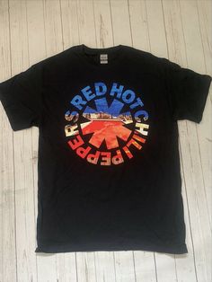 💎 Brand new officially licensed Red Hot Chili Peppers 'Cali Asteris' T-Shirt New Unisex Licensed Merch T-Shirt . 💎New without Tags  💎All of our items are 100% officially licensed and 100% authentic. 💎 All our imagery is taken live of the physical item, to give a real life image of the product. 💎Limited sizes and availability, grab yourself a great deal before it is too late 💎All our items are in stock and ready to be sent out right away from our UK warehouse. Red Band Logo T-shirt, Red Band Merch T-shirt Pre-shrunk, Red Pre-shrunk Band Merch T-shirt, Red Band Merch Top With Logo, Red Band Logo T-shirt With Crew Neck, Red Band Logo T-shirt Merch, Casual Red T-shirt With Band Logo, Red T-shirt With Band Logo For Fans, Red T-shirt With Front Print For Fans