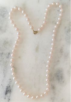 "Natural Faux Pearl Necklace with Gold Tone Spring Ring Clasp Pearls Measure 8mm in Diameter ( 1/4\" in Diameter ) Mot Pearls are Natural Pearl Color 16\" 7.00 18\" 8.50 24\" 9.50 29\" 10.50 36\" 10.50 Endless ( without clasp ) 46\" 11.00 Endless ( without clasp ) COMPLIMENTARY DOMESTIC SHIPPING" Classic Round Hypoallergenic Necklace, Feminine Single Strand Round Beads Jewelry, Feminine Single Strand Jewelry With Round Beads, Classic Rose Gold Pearl Necklace, Classic Jewelry With Lobster Clasp And Round Beads, Classic Single Strand Jewelry For Everyday, Classic Pink Round Jewelry, Classic Pink Pearl Chain Jewelry, Classic Rose Gold Hypoallergenic Necklace