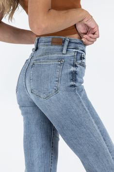 OK, you can stop looking because the PERFECT PAIR OF DENIM has arrived!!! Judy Blue American Honey Mid-Rise Bootcut Denim is one of our most popular pairs of denim, and for good reason. With a highly requested mid-rise and flattering bootcut style, these jeans are guaranteed to look great on all body types! Time to talk details! American Honey features a striking on-trend light wash, soft whiskering, and minimal distressing to give it a lived-in look and feel. These are truly the perfect everyda Mid-rise Medium Wash Flare Jeans, Mid-rise Washed Blue Flare Jeans, Denim Blue Straight Flare Jeans With Frayed Hem, Classic Denim Blue Flare Jeans With Frayed Hem, Classic Flare Jeans In Denim Blue With Frayed Hem, Mid-rise Medium Wash Flare Jeans For Everyday, Classic Mid-rise Blue Flare Jeans, Classic Blue Mid-rise Flare Jeans, Mid-rise Faded Flare Jeans