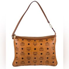 Mcm Logo Jacquard Leather Shoulder Bag. Carry This Bag With Confidence . The Bag Has A Wide Compartment To Fit All Your Purse Necessities. Has Some Normal Minor Wear On The Corner Edges. Comes With Coa Pre-Owned And In Great Condition. Description Mcm Shoulder Bag Brown Leather Graphic Print Gold-Tone Hardware Single Shoulder Strap Suede Lining Zip Closure At Top Details With Estimated Item Measurements: Shoulder Strap Drop: 8.25" Height: 8.25" Width: 11" Depth: 0.25" Color: Brown Item#: W3052700 Formal Shoulder Bag With Removable Pouch In Monogram Canvas, Formal Monogram Canvas Shoulder Bag With Removable Pouch, Formal Monogram Canvas Pouch Shoulder Bag, Monogram Canvas Clutch Shoulder Bag With Removable Pouch, Evening Shoulder Bag In Monogram Canvas, Monogram Canvas Clutch Shoulder Bag, Evening Monogram Canvas Crossbody Shoulder Bag, Designer Brown Shoulder Bag For Evening, Designer Brown Evening Shoulder Bag