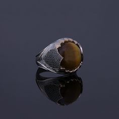 Men's brown tiger's eye statement ring which will give you a head turning presence. This unique, vintage style, engraved 925 Sterling Silver ring has an exquisite design for the polished, refined, and distinguished man. Perfect for casual and formal events, it will make your friends envious as you walk into the room full of confidence and pride and command attention. Looking for a unique, one of a kind GIFT FOR HIM, groomsman gift, father's day gift, teacher day gift? Look no further. This cool Vintage Brown Ring With Polished Finish, Classic Brown Rings With Polished Finish, Brown Hallmarked Rings, Collectible Brown Gemstone Rings, Classic Brown Signet Ring, Brown Polished Signet Ring For Anniversary, Brown Polished Finish Signet Ring For Anniversary, Brown Sterling Silver Signet Ring With Polished Finish, Luxury Brown Ring For Gift