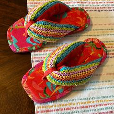 This Sandals New And In Great Condition Have Not Been Previously Used However They Have Minimal Marks From Being Stored Away Without Box. Is Super Cushy Flip Flop Features Pillowy Straps With Colorful Crochet Comfortable Multicolor Flip Flops, Playful Multicolor Flip Flops For Vacation, Tropical Style Multicolor Flat Flip Flops, Tropical Multicolor Flat Flip Flops, Pink Tropical Style Flip Flops With Round Toe, Multicolor Round Toe Tropical Sandals, Multicolor Tropical Sandals With Round Toe, Pink Fabric Sandals For The Beach, Pink Fabric Sandals For Beach