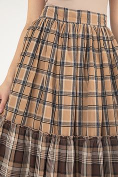 Mixed plaid A-line midi skirt- Side zipper - Lined with regular lining and tulleFabric Content: - Self 100% Cotton; Cont 100% Cotton; Lining 100% RayonCare: Gentle machine wash with like colors in cold water. Tumble dry low. Model is wearing size: SModel Measurements:Height: 5'9"Bust: 34"Waist: 24"Hips: 34"Fabric Content: - Self 100% Cotton; Cont 100% Cotton; Lining 100% RayonCare: Gentle machine wash with like colors in cold water. Tumble dry low. Style No. MS0115L-MULTI BRN Plaid Tiered Skirt With Ruffles, Plaid Cotton Skirt With Ruffles, Plaid Tiered Lined Skirt, Plaid Cotton Flared Skirt, Cotton Plaid Flared Skirt, Fall Patchwork Brown Skirt, Casual Brown Patchwork Skirt, Plaid Tiered Ruffled Skirt, Long Plaid Skirt Brown