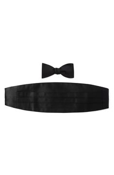 A classic bow tie and pleated cummerbund are rendered in pure silk perfect for your next formal occasion. 2 1/2" bow tie width; 5 1/2" cummerbund width Bow tie is pre-tied; adjustable 100% silk Dry clean Imported Classic Bow With Bow Tie Back, Classic Black Tie With Decorative Bow, Formal Ties With Decorative Bow For Black-tie Events, Classic Bow Ties For Black-tie Events, Tuxedo Bow For Black-tie Events, Luxury Detachable Bow For Evening, Elegant Evening Suit And Tie Accessories, Dapper Ties With Detachable Bow For Black-tie Events, Classic Bow For Black-tie Events