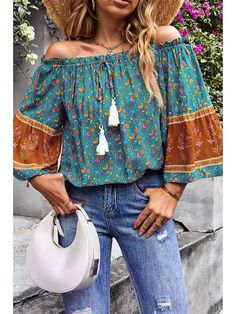 Experience the perfect balance of style and comfort with our Jamie Off Shoulder Long Sleeve Drawstring Floral Top. The off-shoulder design adds a touch of elegance, while the adjustable drawstring allows for a personalized fit. Make a statement with the vibrant floral print and feel confident in every step. Casual Green Off-shoulder Summer Top, Spring Multicolor Tops With Drawstring, Bohemian Off-shoulder Top For Beach, Multicolor Off-shoulder Bohemian Tops, Bohemian Off-shoulder Multicolor Tops, Bohemian Multicolor Off-shoulder Tops, Bohemian Long Sleeve Off-shoulder Top For Vacation, Casual Green Off-shoulder Top, Floral Print Off-shoulder Top For Vacation