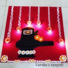 this is an image of a decorated diwal with lights and flowers on the floor