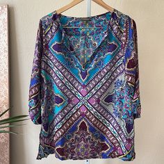 Selling This Beautiful Patterned Tunic Blouse From Tommy Bahama. Purchased And Never Wore. Size M. You Can Wear With Anything And Even As A Swimsuit Cover. Please Review All Pictures. All Sales Final. All My Items Come From A 100% Smoke Free/Pet Free Environment. Offers Welcome. Check Out My Other Items. Purple V-neck Beach Top, Blue Paisley Print Beach Top, Beach Blue Tops With Paisley Print, Printed Purple Blouse For Vacation, Purple Printed Blouse For Vacation, Bohemian Multicolor Print Beach Blouse, Bohemian Multicolor Print Blouse For Beach, Bohemian Blouse With Vibrant Print For Beach, Beach Purple Printed Blouse