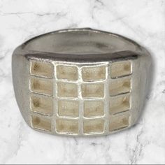 Guaranteed lowest price and Best Quality. If another seller has a lower price, we will beat it by 10%.* Made in the USA Sterling Silver Ring .925 silver. Please contact for other sizes. Rough Casted, Requires Despruing and Filing, For Silversmiths or DYI Jewelers Item: Rough Casted Ring Quantity: 1 Opening Measurement: 3mm x 2mm Rectangle x 16 Top Width: 13mm Bottom Width: 4.5mm Weight 10.10 grams on Size 8 Size: NA Shape: NA Accent stones: NA Material: Solid Sterling Silver .925 Ring Sizes Available: 7-9 Origin: USA David is a Graduate Gemologist from the Gemological Institute of America. You can be rest assured of the quality of our products. All our gemstones are properly graded and tested for authentic. All our jewelry is made in the USA and is tested for quality and proper material co Beat It, 925 Ring, Ring Sizes, Sterling Silber, Sterling Silver Ring, Silver 925, Lowest Price, Silver Ring, Sterling Silver Rings