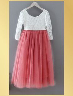 Dusty Rose Tulle Flower Girl Dress in Long Sleeves Our whimsical boho style special occasion dresses are the perfect choice for your little princess. The dress has a gorgeous lace bodice and is long sleeves. Dress Features A soft white bodice, made of stretchy lace with a "V" shaped on the back, edged with delicate lace A cotton liner under 2 layers of soft tulle that won’t itch your princess. Dress length of mid-calf to floor depending on child’s height Sashes are not attached and come in a var Spring Princess Style Lace Patchwork Dress, Princess Style Lace Patchwork Dress For Spring, Spring Princess Dress With Lace Sleeves, Pink Lace Bridesmaid Princess Dress, Pink Lace Princess Dress With Tulle Skirt, Pink Tutu Dress With Lace Bodice For Dress-up, Pink Lace Tutu Bridesmaid Dress, Princess Dress With Lace Patchwork For Spring, Spring Princess Dress With Lace Patchwork