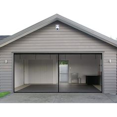 a garage with an open door on the side