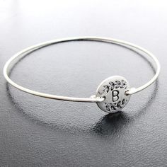 "Please mention initials needed in \"notes\" during checkout for your vine motif monogram bridesmaid initial bracelets. I can also add a FREE SECRET 2nd initial, number, footprint, star, horseshoe or heart on the back... Please mention in notes during checkout. I make these personalized initial bangles on your choice of silver plated disc with bangle band in silver filled or sterling silver-- or on a gold plated disc with bangle band in brass or 14k gold filled bangle-- or on a copper plated dis Adjustable Engraved Name Bracelet For Bridesmaid Gift, Customizable Silver Name Bracelet For Bridesmaid Gift, Adjustable Monogram Bracelets For Anniversary, Adjustable Initials Bracelet For Wedding, Silver Name Bracelet With Initials For Wedding, Adjustable Monogram Round Bracelets, Adjustable Silver Monogram Bracelet, Silver Monogram Bracelet With Adjustable Fit, Adjustable Monogram Jewelry For Wedding