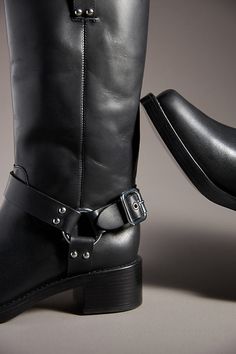 The Francesca Boots by Reformation feature a rugged leather upper with moto-inspired buckle detailing and a block heel for just the right amount of edge. | Francesca Moto Boots by Reformation in Black, Women's, Size: 5, Leather/Rubber at Anthropologie Calf Leather Moto Boots With Square Toe For Fall, Western Leather Knee-high Boots With Block Heel, Fall Calf Leather Moto Boots With Buckle, Leather Moto Boots With Buckle Closure For Riding, Leather Moto Boots With Buckle For Riding, Rugged Moto Boots With Buckle Closure For Biker Events, Square Toe Calf Leather Boots With Buckle Closure, Calf Leather Boots With Buckle Closure And Square Toe, Leather Moto Boots With Square Toe For Work