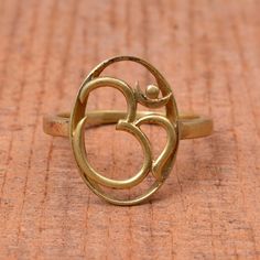 "Om ring, 14k Gold ring, Ohm Ring, Designer Ohm Ring, Vintage Ring, Dainty Ring, Handmade Ring, Meditation Ring, Religious Ring, Yoga Ring ❥ Add this beautiful one little thing of galactic shine to make you feel unique and to transform your lives. Perfect for any kind of outfit and every occasion. ❥ Customers' satisfaction is our biggest priority, please contact us with any questions/queries for future or existing orders, and we will do our best to make sure you are happy with your order. ❥Please make sure to add the correct address during check out. You can return your purchased item within 15 days after successful delivery. We offer a 100% \"Money Back Guarantee\" if you are not satisfied with your purchase. Return charges will be paid by buyers only! Thank You for visiting! REALJEWELRYJ Ohm Ring, Black Obsidian Ring, Yoga Ring, Sassy Nails, Ethiopian Opal Ring, Zierlicher Ring, Brass Band, Meditation Rings, Plain Bands