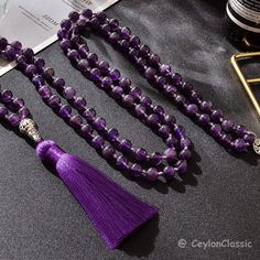 PLEASE READ THIS DESCRIPTION CAREFULLY!  First of all, you are warmly welcomed to my newly started Etsy shop!  This High-quality amethyst beads knotted hold beads meditation mala is made in 8mm natural amethyst.  It is 100% handmade and of exquisite quality.  This mala necklace can be delivered to some countries like the UK within 7-14 DAYS. These days this necklace is available at a SPACIAL DISCOUNT and I can guarantee 100% quality of this product. If you have any questions feel free please don Adjustable Amethyst Beaded Necklaces For Meditation, Spiritual Amethyst Beaded Necklaces, Amethyst Gemstone Beads Necklace For Meditation, Purple Beaded Crystal Necklace For Meditation, Spiritual Amethyst Beaded Necklace, Spiritual Lavender Crystal Necklace With Gemstone Beads, Purple Gemstone Beads Crystal Necklace For Meditation, Spiritual Purple Round Beads Crystal Necklace, Purple 8mm Bohemian Beads