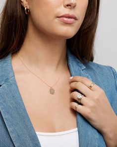 14k solid gold 6 round, natural diamonds: Total carat weight: approximately 0.018 Color: G-H Clarity: SI Pendant dimensions: Length: 15 mm Width: 15 mm Thickness: 1.25 mm Pendant bail dimensions: Height: 6 mm Opening: 3 mm Diamond Cut Cable Chain Length: 16-18 inches, adjustable Width: 0.9 mm Lobster clasp closure Please specify your engraving request in the Engraving section and refer to the text boxes for each placement's character limit. Important to note: This product includes the pendant an Diamond Accented Medallion Jewelry For Gifts, Everyday 14k Gold Medallion Charm Necklace, Medallion Jewelry With Diamond Accents As Gift, Diamond Cut Medallion Jewelry, Delicate Engraved White Gold Jewelry, Personalized Round Cut Diamond Jewelry, Fine Jewelry Diamond With Engraved Details, Engraved Diamond Fine Jewelry, Elegant Birthstone Medallion Charm Necklace