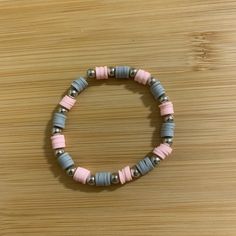 Pink and gray clay bead bracelet Grey Clay Bead Bracelet, Clay Bead Bracelet Ideas, Bead Bracelet Ideas, 50 Sent, Beaded Braclets, Holiday Bracelets, Clay Bead Bracelet, Bracelet Inspo, Bead Charms Diy