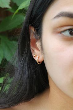 Little gold hoops and ball-post studs, all 14k gold filled. Great everyday basics and perfect for multiple piercings :)  Please select the earrings you need from the dropdown menu: 1) One hoop earring 2) Pair hoop earrings 3) One ball stud 4) Pair ball studs 5) Pair hoops & one stud 6) Pair studs & Minimalist 14k Gold Filled Cartilage Earrings For Everyday, Dainty 14k Gold Filled Piercings For Everyday, Gold Hoop Piercings In Minimalist Style, Gold Hoop Piercings Minimalist Style, Minimalist Gold Hoop Piercings, Dainty Gold Small Hoop Wrap Earrings, Minimalist Gold Piercings With Matching Earrings, Minimalist 14k Gold Filled Piercings, Gold Dainty Huggie Wrap Earrings