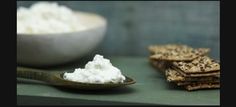 crackers and cottage cheese on a table