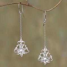 Raining elegantly from the ears two flowers are handcrafted with intricate sterling silver filigree. Javanese artisan Selly Sagita designs these dangle earrings which feature lengths of petite sterling chain. Flower Rain, Ad Earrings, Two Flowers, Earrings Flower, Sterling Silver Filigree, Silver Filigree, Hook Earrings, Winter Wedding, Pop Art