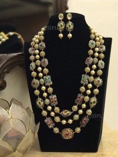 Most eligible gift for someone you love. Inspired by the Nizam of Hyderabad this set has Fine quality Emerald Green, ruby red onyx and Kundan semiprecious beads long necklace with earrings Necklace Length: 19 inches Highest quality and craftsmanship You can ask questions on Email ID: vijaygarg579vg@gmail.com Luxury Red Heavy Kundan Necklace, Luxury Elegant Temple Necklace With Zari Work, Elegant Multicolor Gemstone Temple Necklace, Elegant Multicolor Meenakari Necklace, Elegant Multicolor Temple Necklace For Celebration, Elegant Multicolor Temple Necklace As Gift, Elegant Multicolor Temple Necklace For Diwali, Intricate Design Kundan Long Necklace For Gift, Long Kundan Necklace With Intricate Design As A Gift