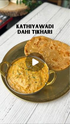 an image of food on a plate with the words kathiyawaddi dahi tikkari