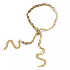 - Bohemian Style Elegant Look for any occasion - Braided golden metal and woven fabric makes this gorgeous piece - Handmade piece - Manually knot for closure - Length: 14” plus 3” chain tassel in each end - Adjustable, fits all - Make your own style, wear as many as you want to create your unique & personal look. - Infinite uses… Can be used as bracelet, choker, anklet and more. Adjustable Gold-tone Bracelets, Adjustable Gold Lariat Choker, Elegant Adjustable Woven Bracelets, Adjustable Gold-tone Jewelry Fashion Accessory, Elegant Woven Adjustable Bracelets, Bohemian Necklace With Adjustable Length For Parties, Bohemian Jewelry With Adjustable Length For Party, Bohemian Style Jewelry With Adjustable Length For Parties, Bohemian Party Necklace With Adjustable Length