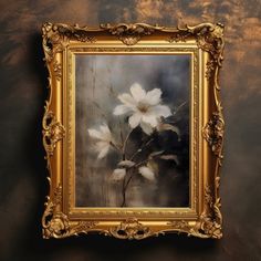 a painting with white flowers in a gold frame