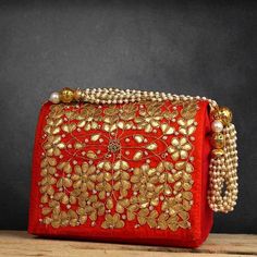 Salamender Orange Hand Crafted Clutch Handbag With Beaded Chain For Women | indian wedding evening bag clutch | fabric clutch purse handmadeHandmade Gotta Patti Work Clutch(For Traditional Indian Wedding) Suitable for every special occasion.Add grace to your dressings.Perfect For Weddings.These bags can be also used for gift purpose . Festive Shoulder Bag With Zari Work For Receptions, Elegant Bag With Mirror Work For Diwali, Traditional Embellished Potli Bag For Evening, Festive Embellished Potli Bag As Gift, Rectangular Embellished Potli Bag For Festivals, Traditional Embellished Rectangular Potli Bag, Traditional Embellished Shoulder Bag For Festive Season, Traditional Embellished Bags For Festive Season, Traditional Embellished Clutch For Festivals