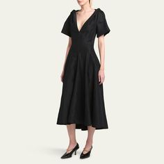 Bottega Veneta fluid viscose and linen midi dress features twist details at the shoulders V-neckline Short sleeves Hem falls below the knee A-line silhouette Concealed back zip  Viscose/linen Made in Italy Linen A-line Evening Dress, Formal V-neck Linen Dress, Spring Evening A-line V-neck Dress, Chic Linen Midi Dress For Evening, Formal Knee-length Linen Midi Dress, Knee-length Linen Midi Dress For Formal Occasions, Elegant Linen V-neck Dress, Formal Linen Midi Dress, Spring Evening V-neck Midi Dress