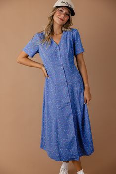 This blue beauty features functional buttons, a v-neckline, and a sewn-in tie. Pair the Head First Button Down Dress with your favorite pair of sneakers and a trucker hat for a trendy and cute look. nursing friendly Dress And Sneakers, Dress And Sneakers Outfit, Pictures Outfits, Beauty Features, Blue Beauty, Family Picture Outfits, Nursing Friendly, Picture Outfits, Down Dress