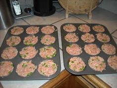 two pans filled with food sitting on top of a counter next to an oven