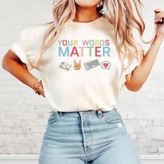 a woman wearing a t - shirt with the words your words matter written on it