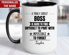 a black and white coffee mug with the words, a truly great boss is hard to find