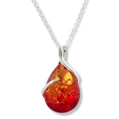 Amber Extraordinaire Sterling Silver Pear Ombré Stone Pendant A single, sterling vine stretches around the glistening amber showcased on this pendant with chain pairing, such a romantic find.           Pendant approx. 1-1/2"L x 3/4"W     Chain approx. 18"L x 1/16"W with 1-1/2" extender     Stamped .925 sterling silver; polished finish      Pendant: fixed, pull-through bail     Anchor-link chain with amber accent bead: spring-ring clasp     Stone Information       All sizes and weights approximat Amber Teardrop Birthstone Jewelry, Sterling Silver Amber Teardrop Pendant Necklace, Amber Teardrop Pendant Necklace In Sterling Silver, Elegant Baltic Amber Necklace In Orange, Elegant Orange Baltic Amber Necklace, Amber Teardrop Necklace With Polished Finish, Polished Teardrop Amber Necklace, Baltic Amber Gemstone Necklace Gift, Baltic Amber Gemstone Necklace For Gift