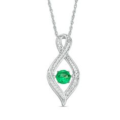 Celebrate your growing and evolving romance with this sparkling fashion pendant from the Unstoppable Love™ Collection. Crafted in sterling silver, this shimmering look features a diamond-lined infinity-symbol-topped frame with a twisting flame-shaped base. Inside, a 4.5mm lab-created verdant-green emerald glistens in a unique setting that moves with every beat of her heart and every turn of her head. Captivating with 1/10 ct. t.w. of diamonds and a bright polished shine, this pendant suspends al Elegant Infinity Jewelry With Accent Stones, Slytherin Jewelry, Infinity Symbol Tattoo, Zales Zales, Infinity Tattoos, Dragon Tattoo Designs, Skull Tattoo Design, Lab Created Emerald, Fashion Pendant