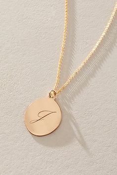 Just as effortless as it is elegant, this stunning necklace features an oval pendant with gorgeous cursive engraved initial for the ideal finishing touch. * 14k Gold Filled chain * Personalized, laser engraved, 14k Gold Filled 17x22mm oval pendant * Length: 20" * 5 days of production | Set & Stones Personalized Amelia Necklace at Free People in Gold Elegant Oval Link Charm Necklace For Gifts, Classic Oval Link Personalized Necklace, Elegant Personalized Initial Necklace For Formal Occasions, Elegant Initials Charm Necklace, Elegant Gold Initials Necklace, Elegant Personalized Oval Pendant Necklace, Elegant Personalized White Gold Initial Necklace, Elegant Oval Engraved Necklace, Elegant Initial Pendant Necklace With Polished Finish