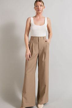 Effortlessly chic and comfortable, our Flowy and Relaxed Straight Leg Pants feature pleats and pockets for added style. They offer all-day comfort. Perfect for dressing up or down, these pants are a versatile addition to your wardrobe.Model Spec: Model is 5'8" and wearing a small.Fabric Contents: 95% Polyester, 5% Spandex Care Instructions: Machine wash cold, gentle cycle, tumble dry low. Size Measurement (inch): S: 14.0 (Waist), 19.0 (Hips), 30.0 (Inseam), 42.0 (Length) M: 14.5 (Waist), 19.5 (H Straight Pants Outfit, Glass Outfit, Trouser Pants Pattern, Thrift Wishlist, Inverted Triangle, Business Pants, Pants Fit, Flowy Pants, Jet Setter