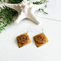 All Speck products were made by REAL Pacific Island women with REAL native Pacific Island materials. ITEM DESCRIPTION: These bold, lightweight teardrop earrings are made from carved coconut shell and bleached a vibrant golden yellow. Earrings measure 1.5" tall and 1.5" wide. ABOUT SPECK: Speck was created to help Pacific Island natives share the genuine beauty and culture of their islands. All Speck products were designed and created by Pacific Island natives. Every necklace, bracelet and earrin Island Women, Saratoga Springs, Yellow Earrings, Coconut Shell, Shell Pendant, Golden Yellow, Real Women, Necklace Bracelet, Teardrop Earrings