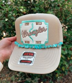 ✨ Wrangler Trucker Hat ✨ Hey cowgirls! This hat is perfect for your next country concert!  Tan Otto Trucker Hat with an adjustable strap and a mesh back.  Turquoise stone chain is optional and can be removed if desired.  OSFM No returns or exchanges please!  Made in Atlanta, GA Stay groovy 🪩 Western Trucker Hats With Patches, Hat With Patch, Hats Cowgirl, Diy Hats, Covington Ga, Hat Bar, Stay Groovy, Country Hats, Cowgirl Gifts