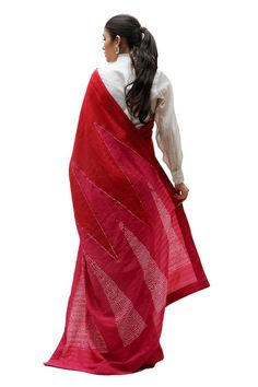 Red and rani silk cotton saree with hand dyed triangular pattern pallu with hand done Bandhani and mirror work. Comes with off white silk unstitched blouse piece in gold and satin tissue stripes. - Aza Fashions Bohemian Red Pre-draped Saree For Festive Occasions, Anarkali Tussar Silk Dupatta With Mirror Work, Red Cotton Dupatta For Diwali, Red Cotton Saree For Wedding, Festive Red Cotton Dupatta, Red Cotton Unstitched Saree, Red Cotton Saree With Dupatta, Designer Cotton Pre-draped Saree, Traditional Red Cotton Dupatta