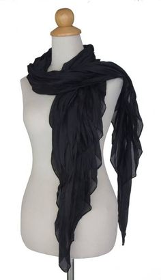 Dyed by hand this luxurious black scarf is the work of Vinita in Thailand. It is pleated for elegant textures and drapes beautifully. Black Scarves, Pleated Scarf, Cape Scarf, Time Clothes, Black Cape, Clothing Design Sketches, Black Scarf, Fur Scarf, Clothing Design