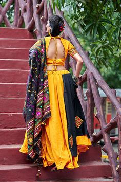 Shubhkala Yellow & Black Soft Cotton Resham Embroidered Navratri Lehenga This beautiful Shubhkala Yellow & Black Soft Cotton Resham Embroidered Navratri Lehenga is a perfect choice for festive occasions. The intricate resham embroidery enhances the ethnic appeal, while the soft cotton fabric ensures comfort throughout the celebrations. Perfect for Navratri, Garba nights, and other festive events, this lehenga adds a traditional yet stylish touch to your wardrobe. Key Features Resham embroidery for a rich ethnic look Soft cotton fabric for comfort Stunning combination of yellow and black Ideal for Navratri and festive events Lightweight and easy to carry Specifications Brand: Shubhkala Color: Yellow & Black Work: Resham Embroidery Occasion: Festive, Navratri, Garba Pattern: Embroidered Leng Yellow Lehenga With Resham Embroidery For Navratri, Yellow Resham Embroidered Dress For Navratri, Black Resham Embroidery Choli For Navratri, Navratri Yellow Lehenga With Floral Embroidery, Yellow Embroidered Fabric For Navratri, Garba Dress, Navratri Special, Ethnic Looks, Yellow Black