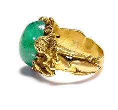 Antique Gold Large Cabochon Emerald Nude Lady Ring Dive into the enchanting realm of Art Nouveau with this magnificent gold ring, a testament to exquisite craftsmanship and artistic vision. This piece features a delicate assembly of sculpted ladies, each figure intertwined gracefully, representing the period's fascination with fluid, natural forms. At the center of this collective beauty sits a striking cabochon emerald, its lush green depths echoing the vibrant life of untouched nature. This si Untouched Nature, Montblanc Pen, Costume Jewelry Earrings, Belt Purse, Ring Sale, Christian Lacroix, Natural Forms, Men's Rings, Lush Green