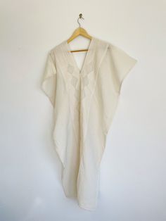 You can't really do summer without a comfortable, versatile tunic dress that's perfect as cover up or a quick trip to town. This casual cotton tunic dress, handmade in Oaxaca with natural dyes, is just what you need! Soft natural tones in a variety of colors offer a unique addition to your summer beach vibe. Handcrafted by skilled artisans using traditional techniques, each dress is made with care and attention to detail. The soft, lightweight cotton fabric and loose, relaxed design make this dr Bohemian Relaxed Fit Unlined Dress, Cotton Tunic For Beach Cover-up With Short Sleeves, Bohemian Beach Dress With Short Sleeves For Daywear, Beige Cotton Linen Dress For Vacation, Oversized Cotton Tunic For Summer, Oversized Cotton Summer Dress, Bohemian Cotton Tunic For Daywear, Summer Cotton Tunic With Relaxed Fit, Summer Cotton Tunic For Daywear