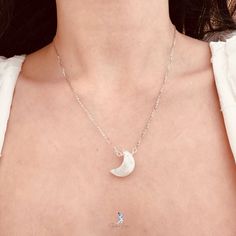 This elegant crescent moon pendant necklace features a crescent moon shape moonstone with blue flash, on solid 925 sterling silver cable chain and platinum plating. Add this elegant crescent moon moonstone pendant necklace to your everyday fine jewelry collection or as gift for your loved ones. Pendant dimensions: 0.68 x 0.48 inNecklace length: 17.5 in with the adjustable ballMaterials: moonstone, 925 sterling silver Jewelry Care: See more information about how to care for your jewelry here. Shipping Policy: Orders will be shipped within 1-3 business days. Economy shipping will take 7-14 days to arrive and standard shipping is 1- 4 days for U.S. orders. International shipping time is depended on the country and per shipping method. Shipping cost will be calculated at check out.For more det Silver Sterling Silver Moon Crystal Necklace, Moon-shaped Sterling Silver Crystal Necklace, Silver Moon-shaped Sterling Silver Crystal Necklace, Celestial Sterling Silver Crystal Necklace With Moon Charm, Silver Crystal Necklace With Moon Charm, Silver Half Moon Moonstone Jewelry, Elegant Silver Crystal Necklace With Moon Phase, Sterling Silver Moon Phase Pendant Crystal Necklace, Sterling Silver Pendant Crystal Necklace With Moon Phase